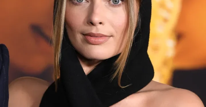 Margot Robbie Responds to Backlash Over Pitt's Kiss