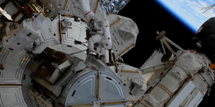 NASA Spacewalkers Installs Station's Fourth Roll-Out Solar Array
